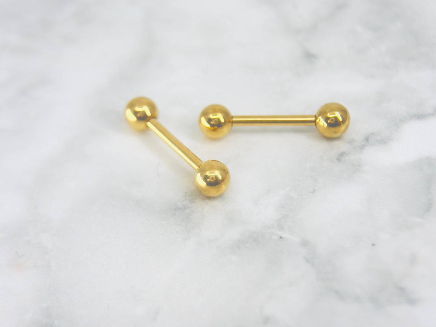 Internally Threaded Gold Nipple Barbell.