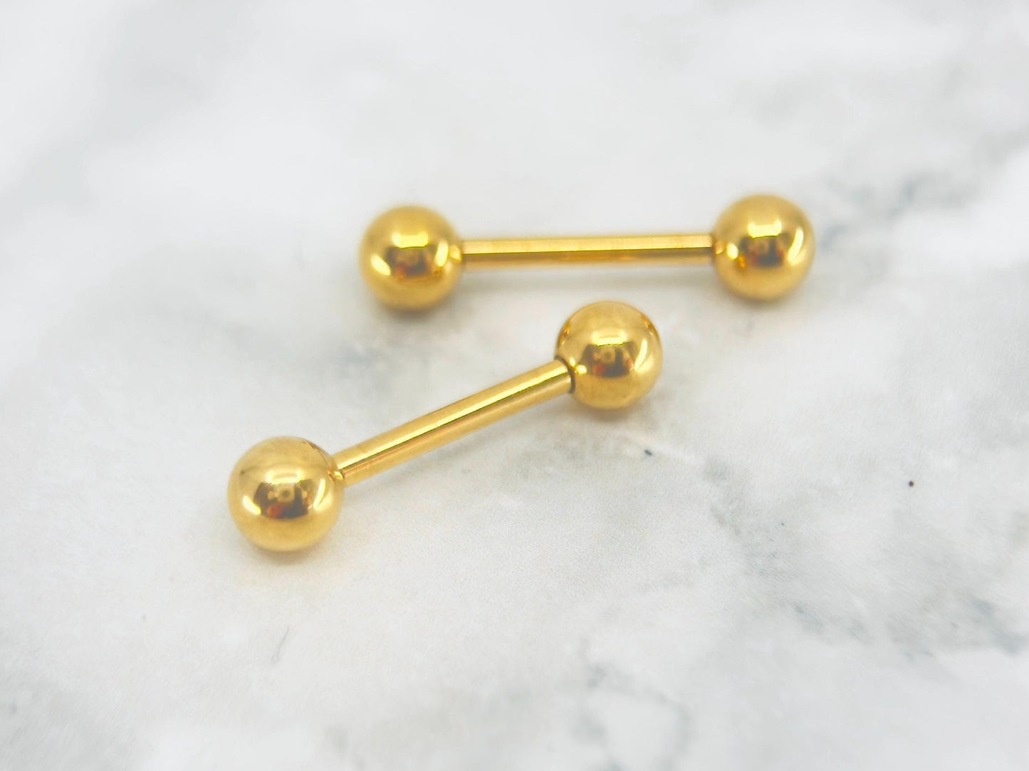 Internally Threaded Gold Nipple Barbell.