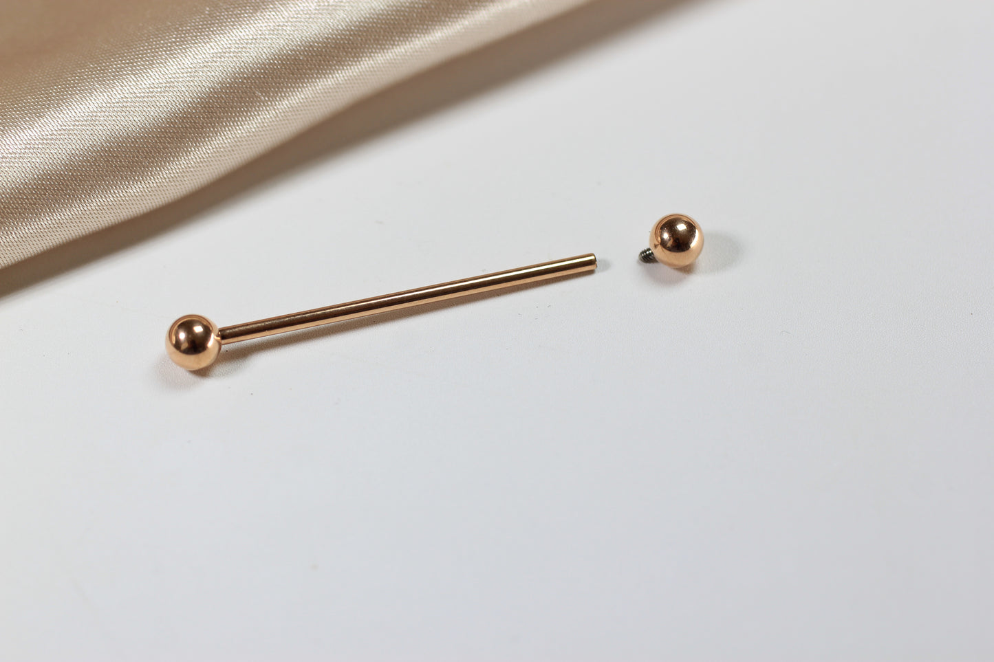 Titanium Industrial Barbell Piercing.