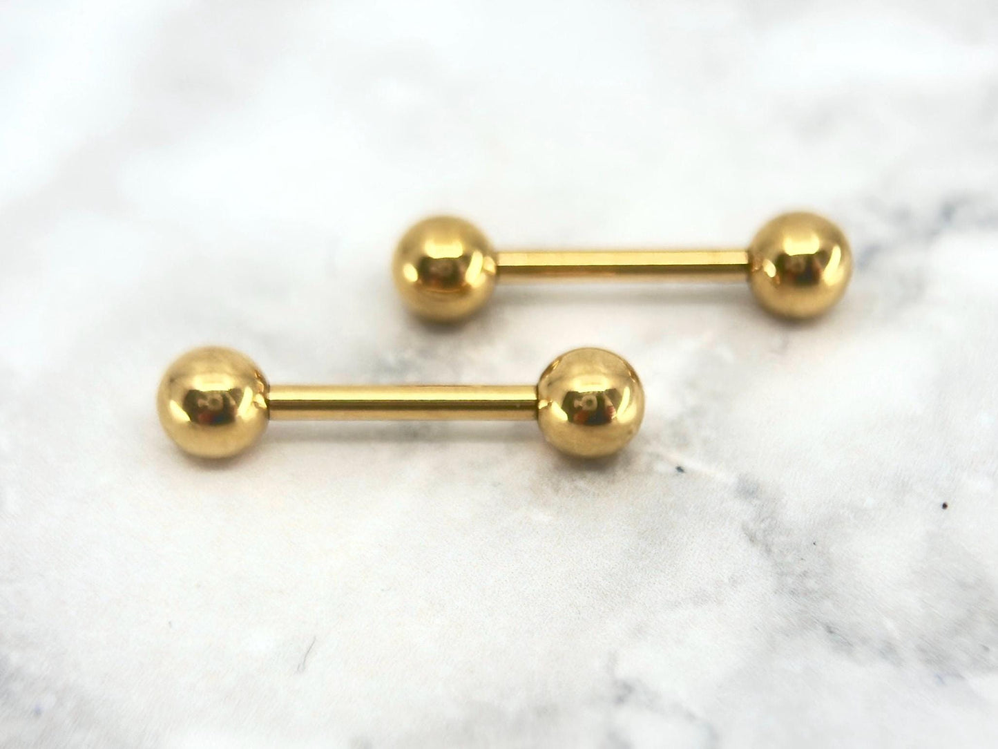 Internally Threaded Gold Nipple Barbell.