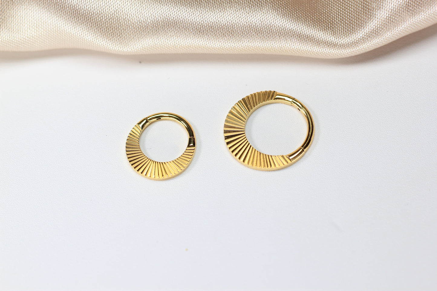 Gold Titanium Faceted Septum Ring.