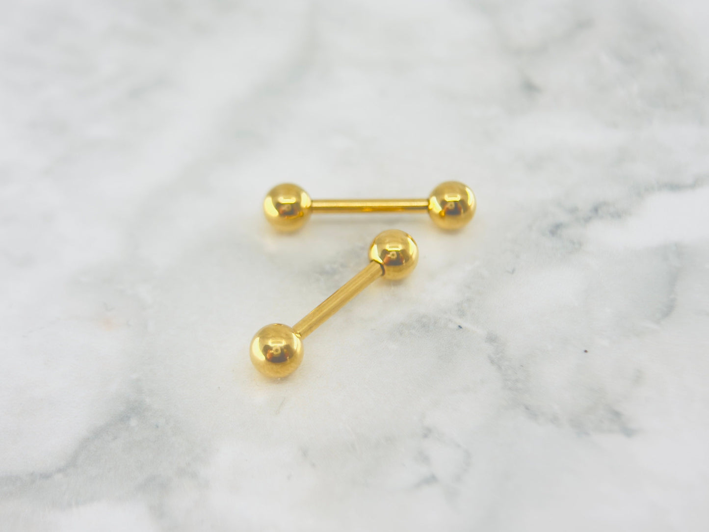 Internally Threaded Gold Nipple Barbell.