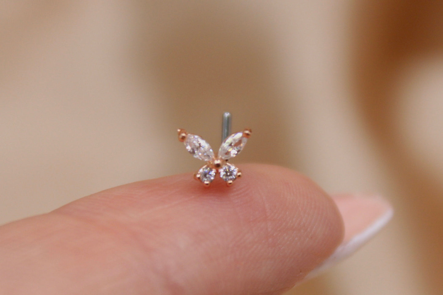 Dainty Rose Gold Butterfly Nose Stud.