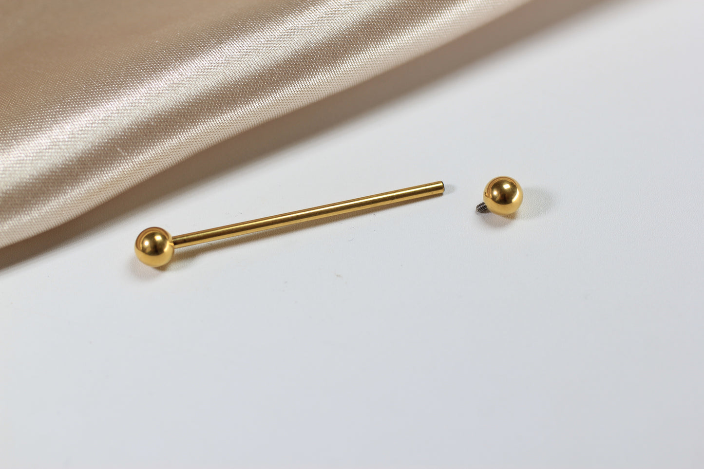 Titanium Industrial Barbell Piercing.