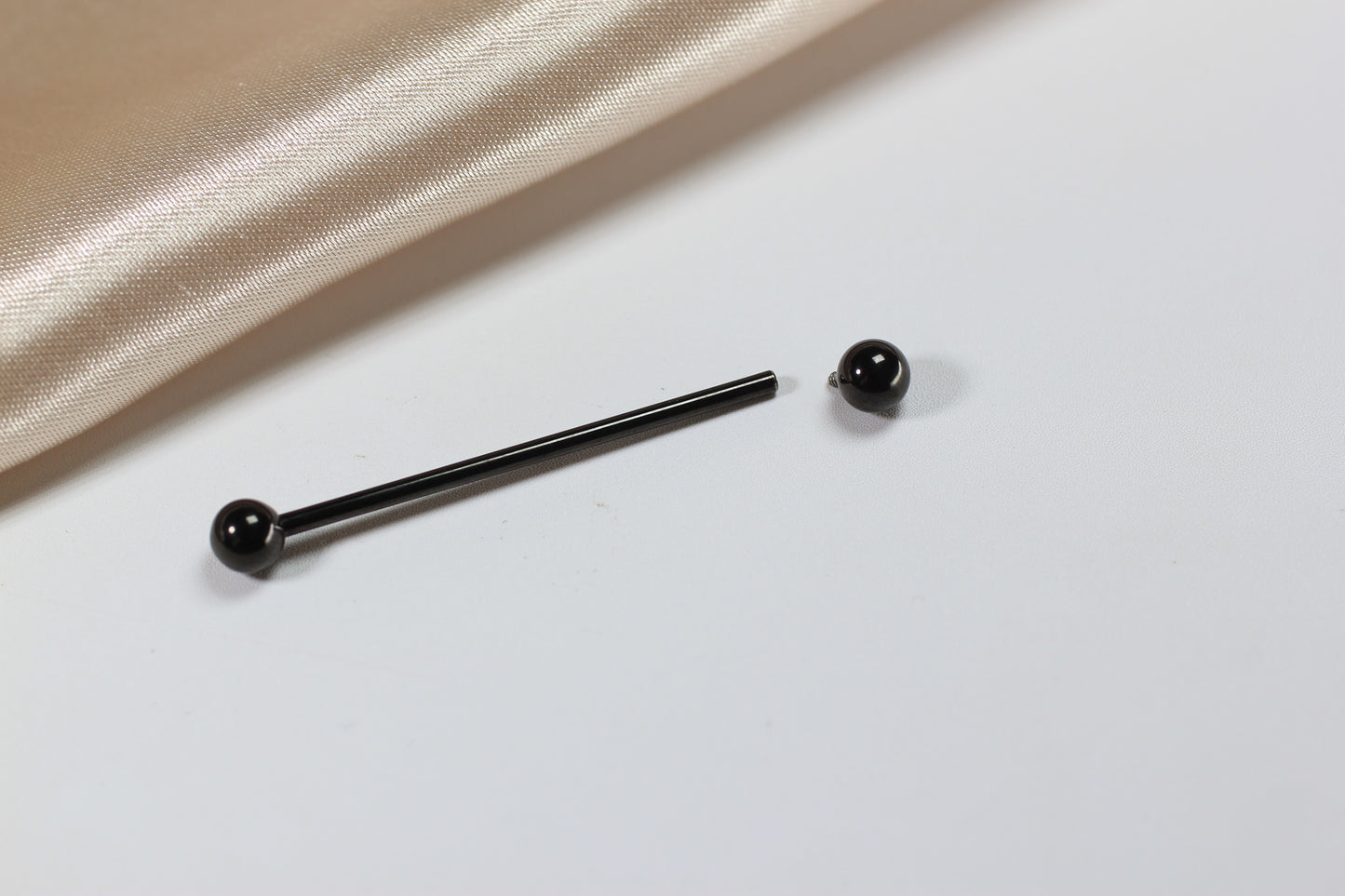Titanium Industrial Barbell Piercing.
