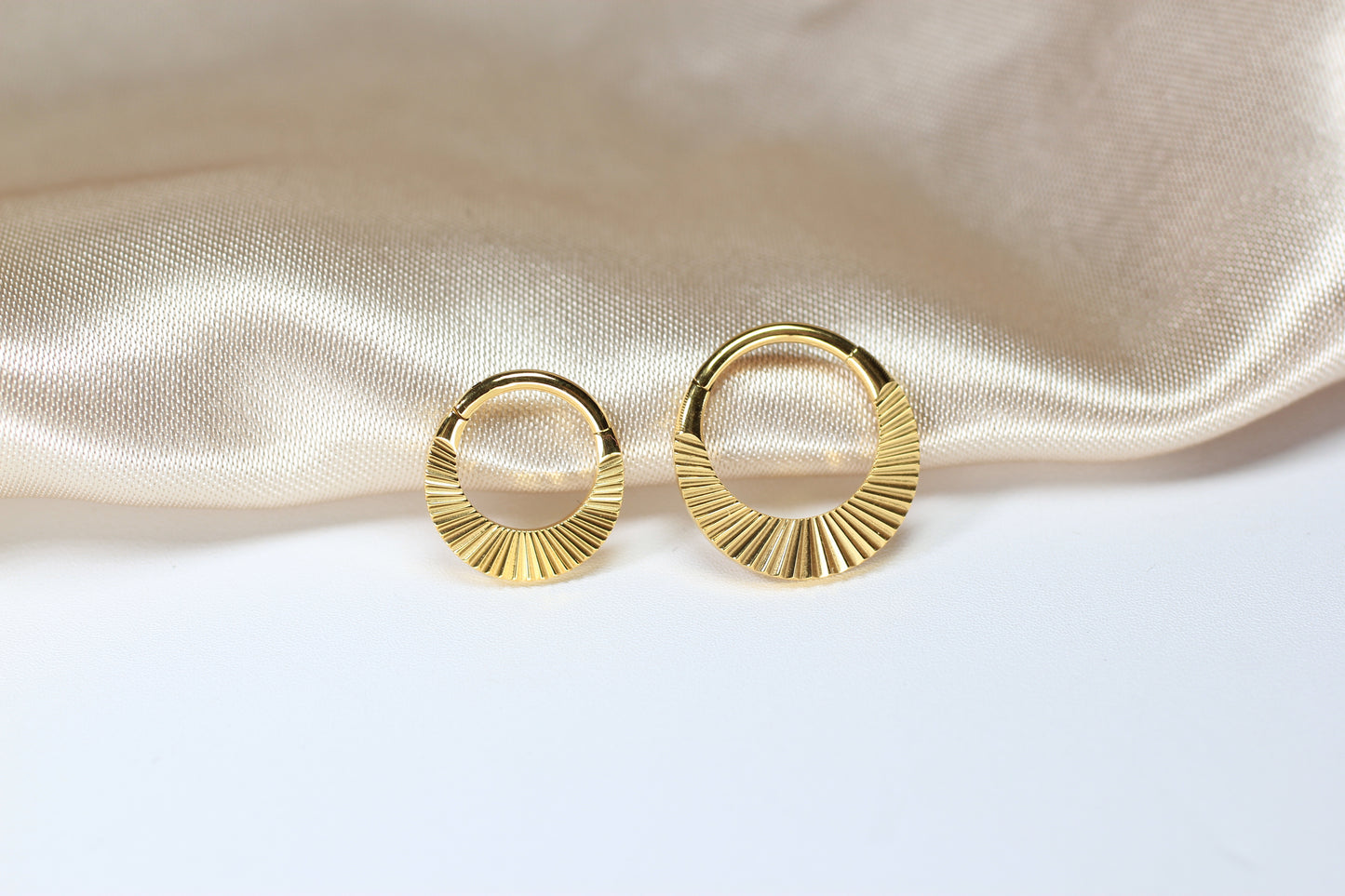 Gold Titanium Faceted Septum Ring.