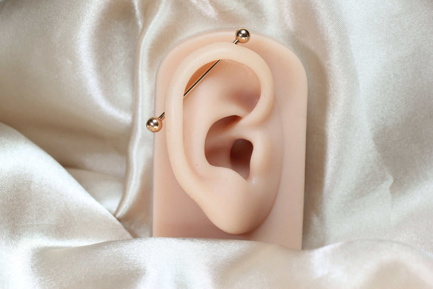 Titanium Industrial Barbell Piercing.