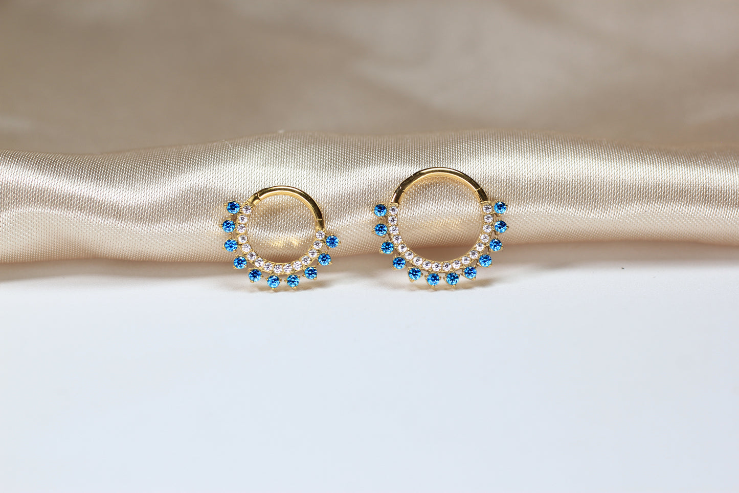 Dainty Blue Topaz Sparkling Titanium Septum Clicker Ring.