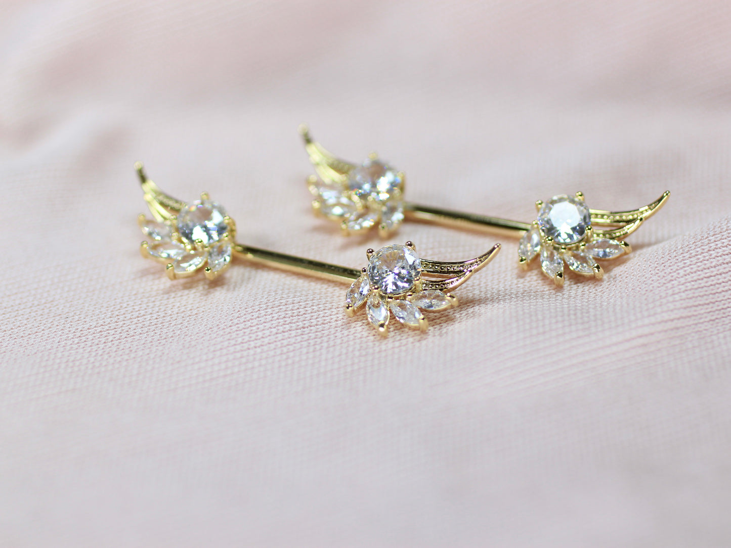 14g Gold Delicate Angel Wing Nipple Barbell Piercing.