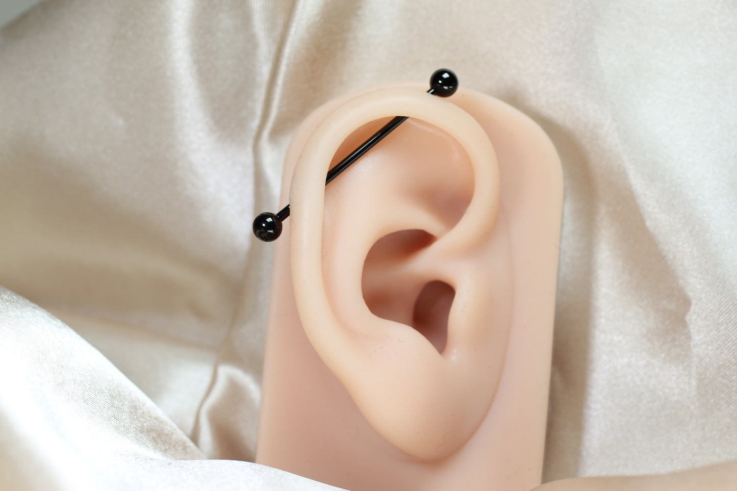 Titanium Industrial Barbell Piercing.