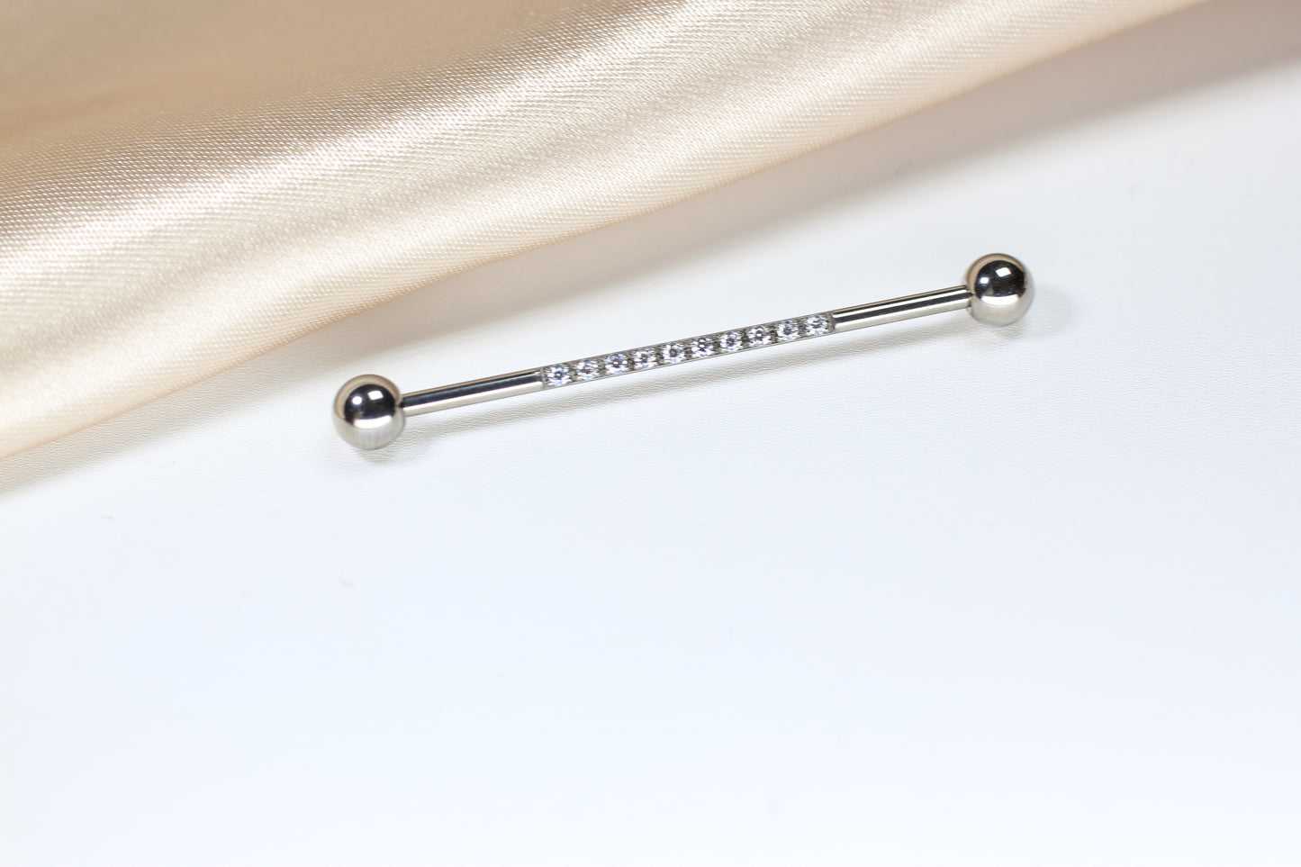 14G Titanium Industrial Barbell with CZ.