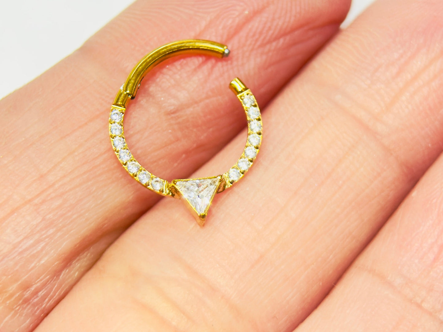 16g Gold CZ Sparkling Multi-Gem Septum Ring. V cut shaped clicker hoop ring. Clear Gem Seamless Septum Ring.