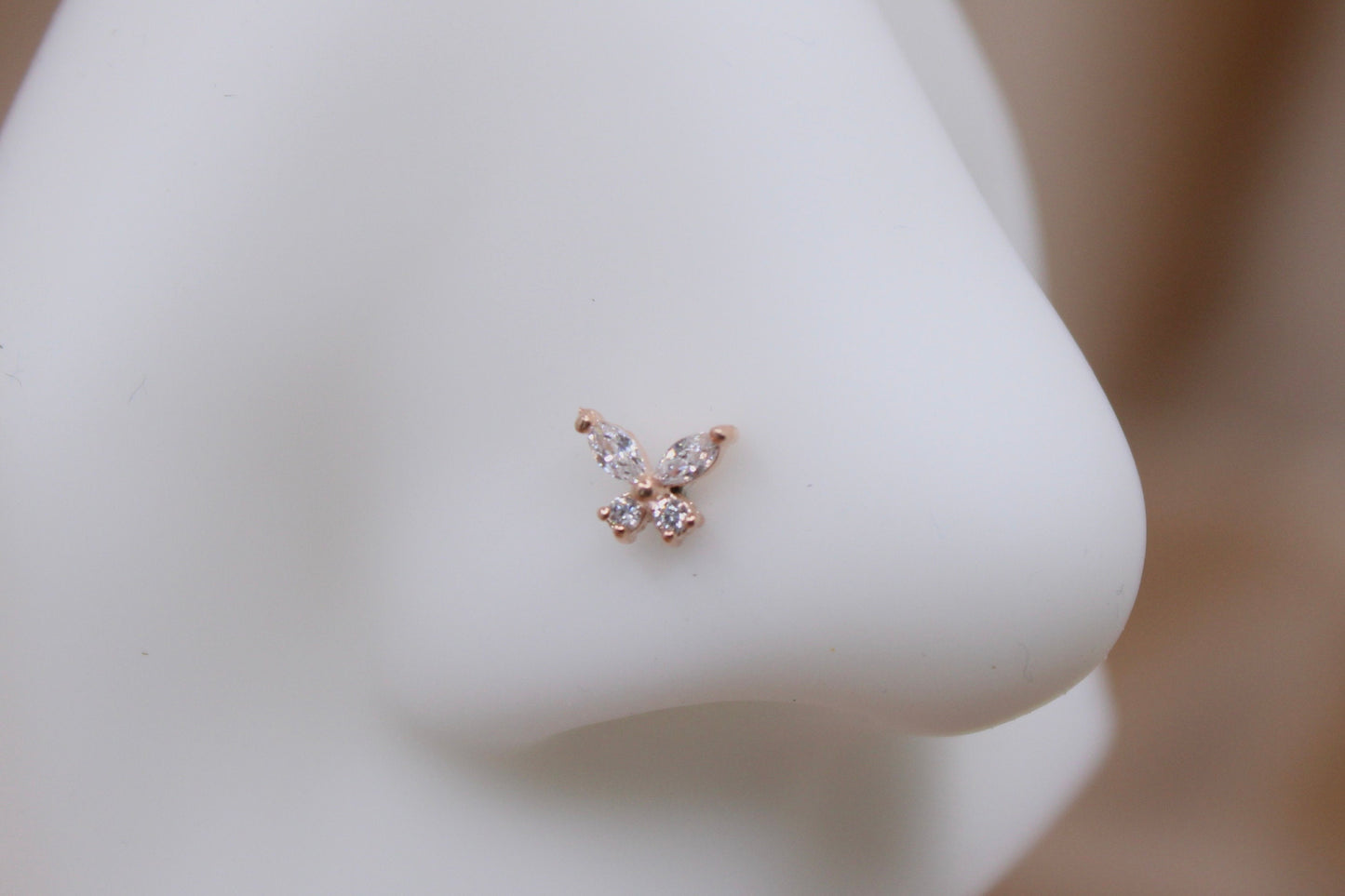 Dainty Rose Gold Butterfly Nose Stud.