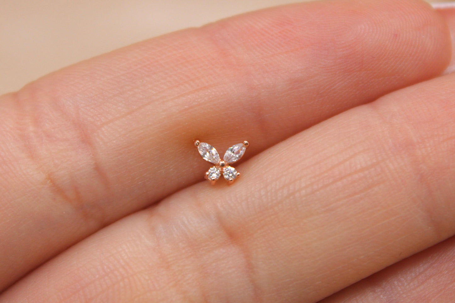 Dainty Rose Gold Butterfly Nose Stud.