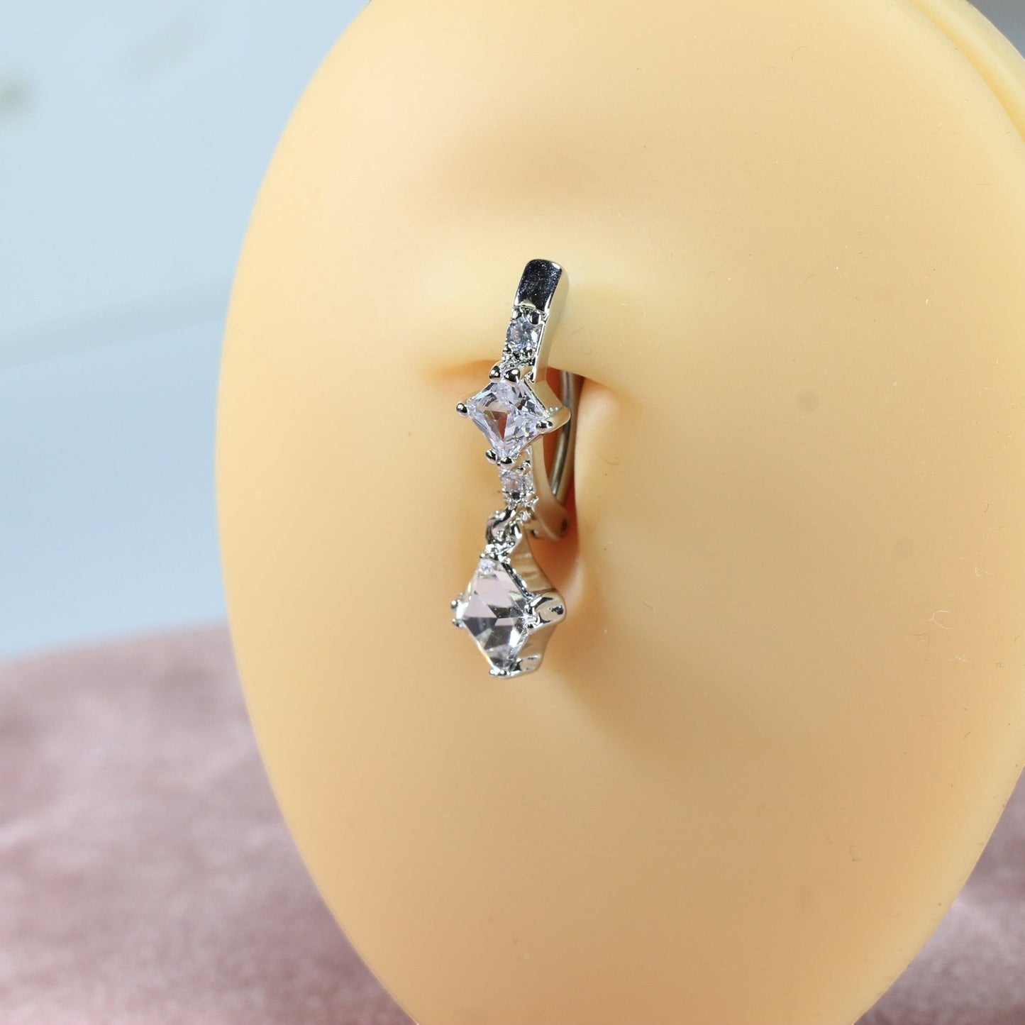 MKBodyJewelry 14g surgical steel belly button ring with dangling CZ stones. Allergy-free metal.