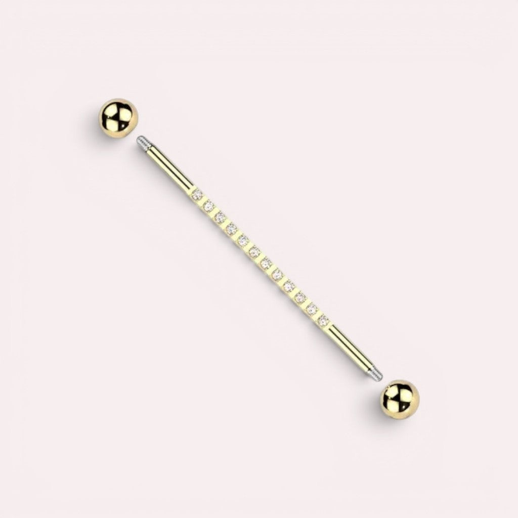 MKBodyJewelry 14G gold titanium industrial barbell with clear CZ stones and 5mm balls. Externally threaded closure.