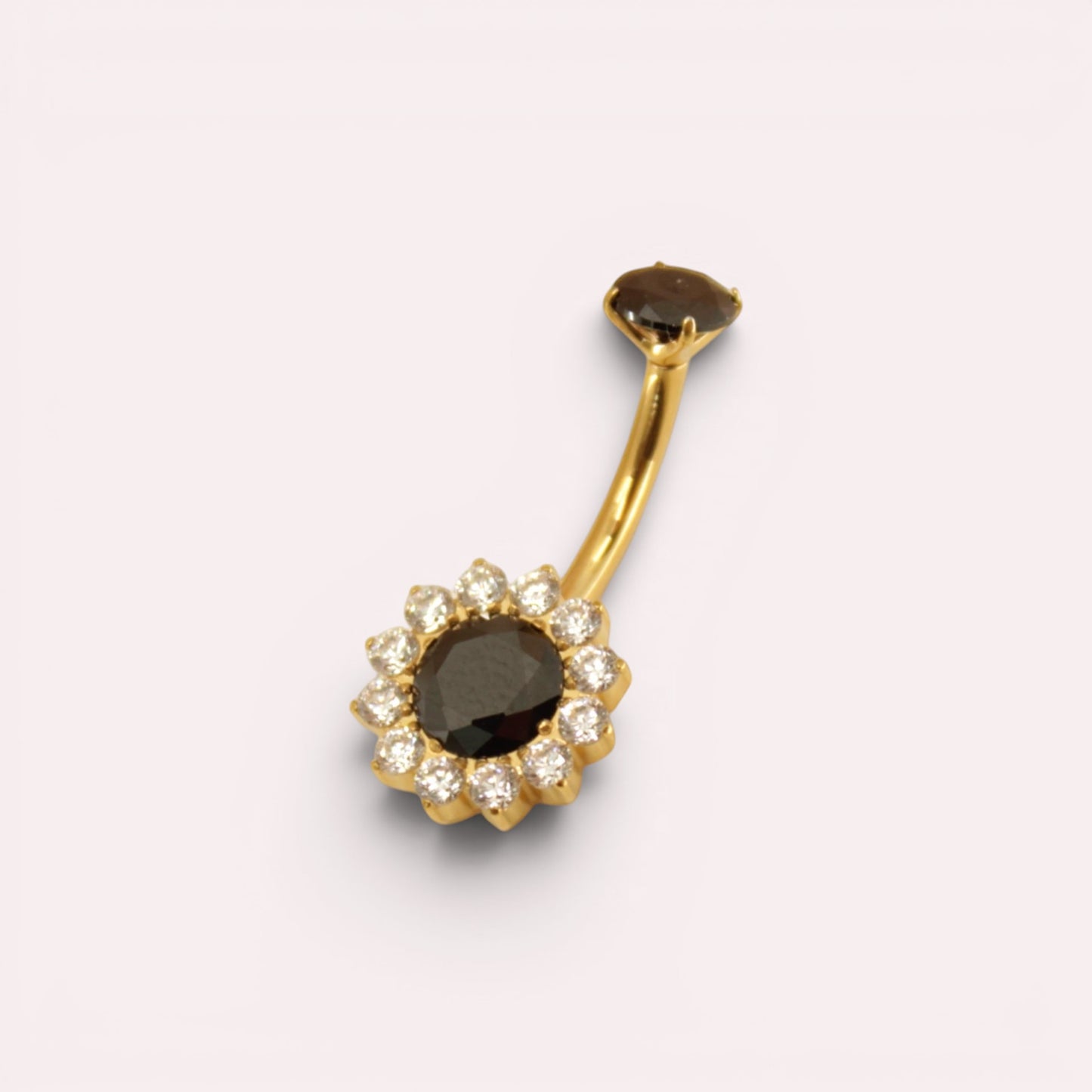 MKBodyJewelry 14g titanium belly button ring with a black floral gemstone design and gold-tone curved barbell.