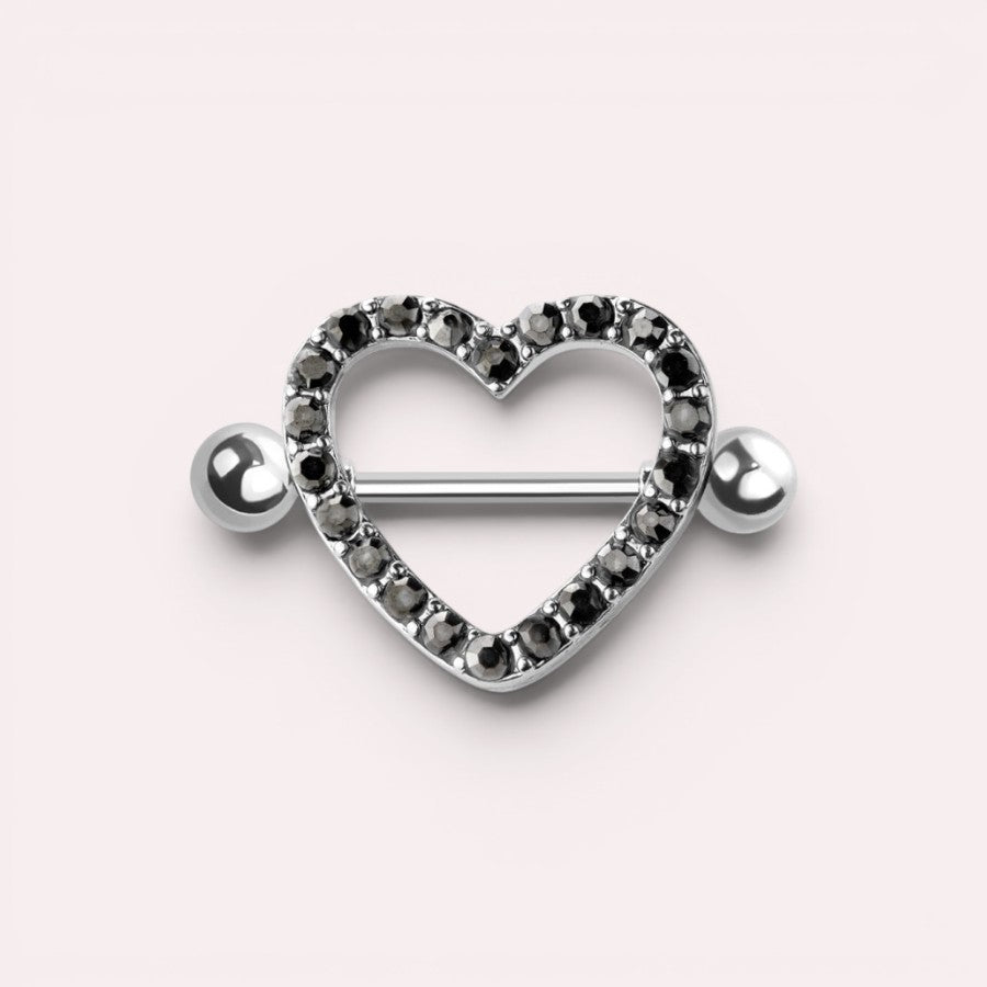 MKBodyJewelry 14G surgical steel nipple barbell featuring a silver heart shield paved with black gemstones.
