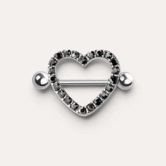MKBodyJewelry 14G surgical steel nipple barbell featuring a silver heart shield paved with black gemstones.