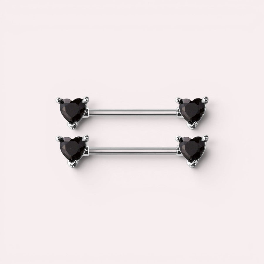 MKBodyJewelry 14g surgical steel nipple barbells featuring black heart-shaped gemstone ends, sold as a pair.