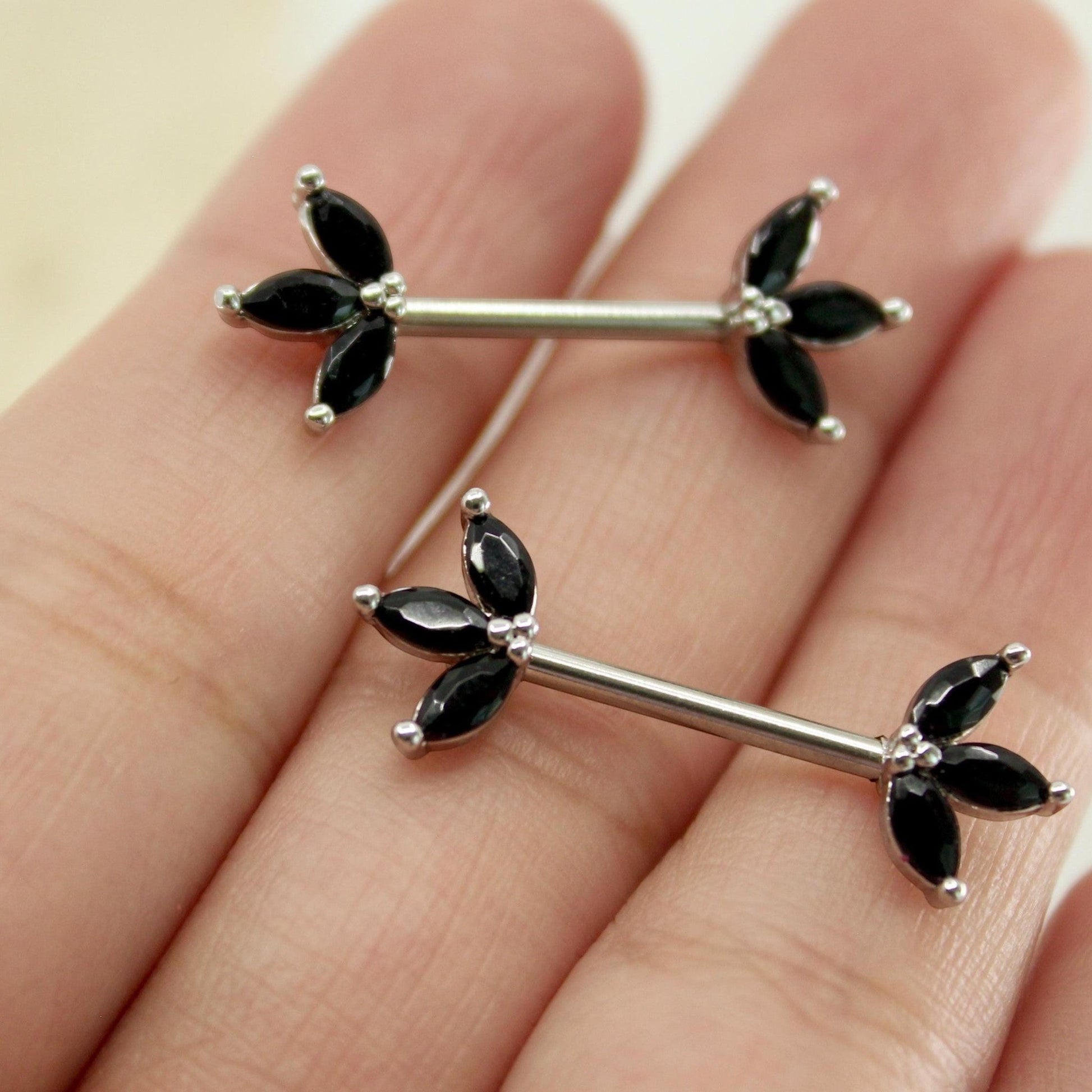 MKBodyJewelry black marquise leaf nipple barbells, surgical steel, 14g. Sold as a pair.