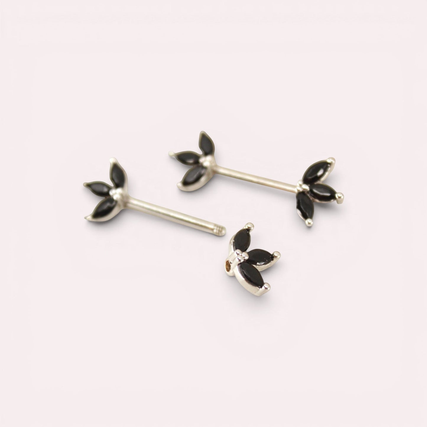 MKBodyJewelry Black marquise leaf nipple barbells made of surgical steel with black gems. Sold as a pair.