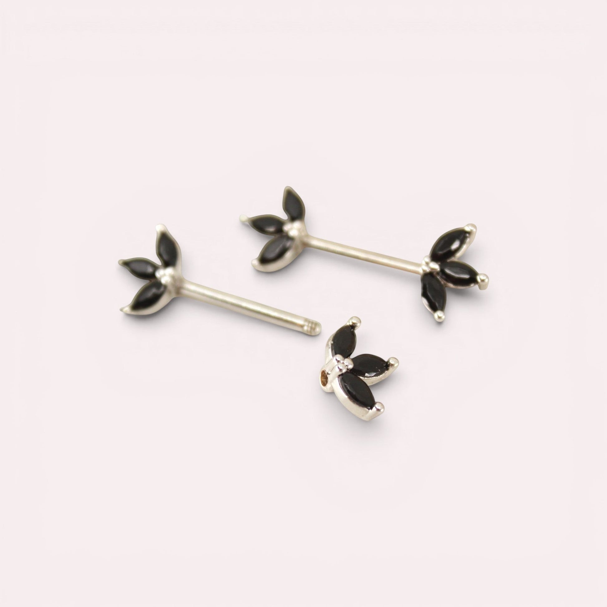 MKBodyJewelry Black marquise leaf nipple barbells made of surgical steel with black gems. Sold as a pair.