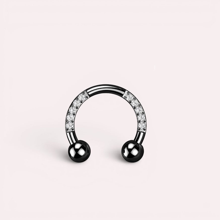 MKBodyJewelry black horseshoe earring with pave CZ sides and black ball ends, made of implant grade titanium.