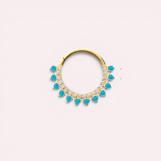 MKBodyJewelry gold septum clicker ring with blue topaz and clear cz stones. Implant grade titanium, 16g, 8mm/10mm diameter.