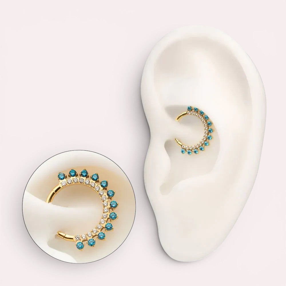 MKBodyJewelry gold titanium septum clicker ring with blue topaz and clear cz stones, 16g thickness, 8mm or 10mm diameter.
