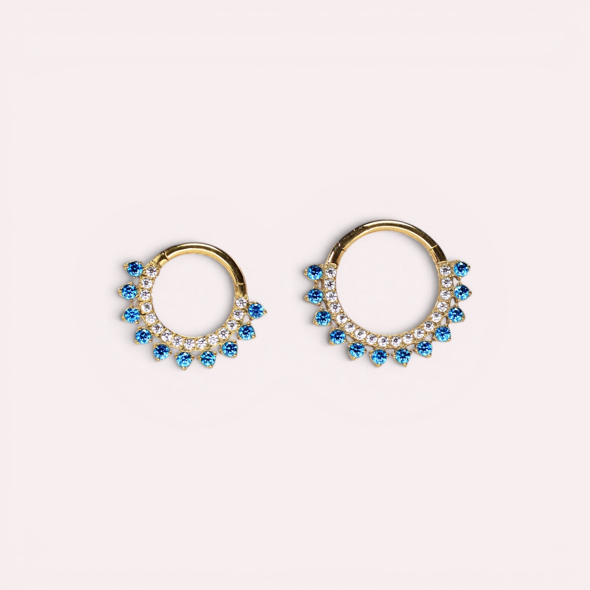 MKBodyJewelry gold titanium septum clicker ring with blue topaz and clear cz gems. 16g, 8mm/10mm.