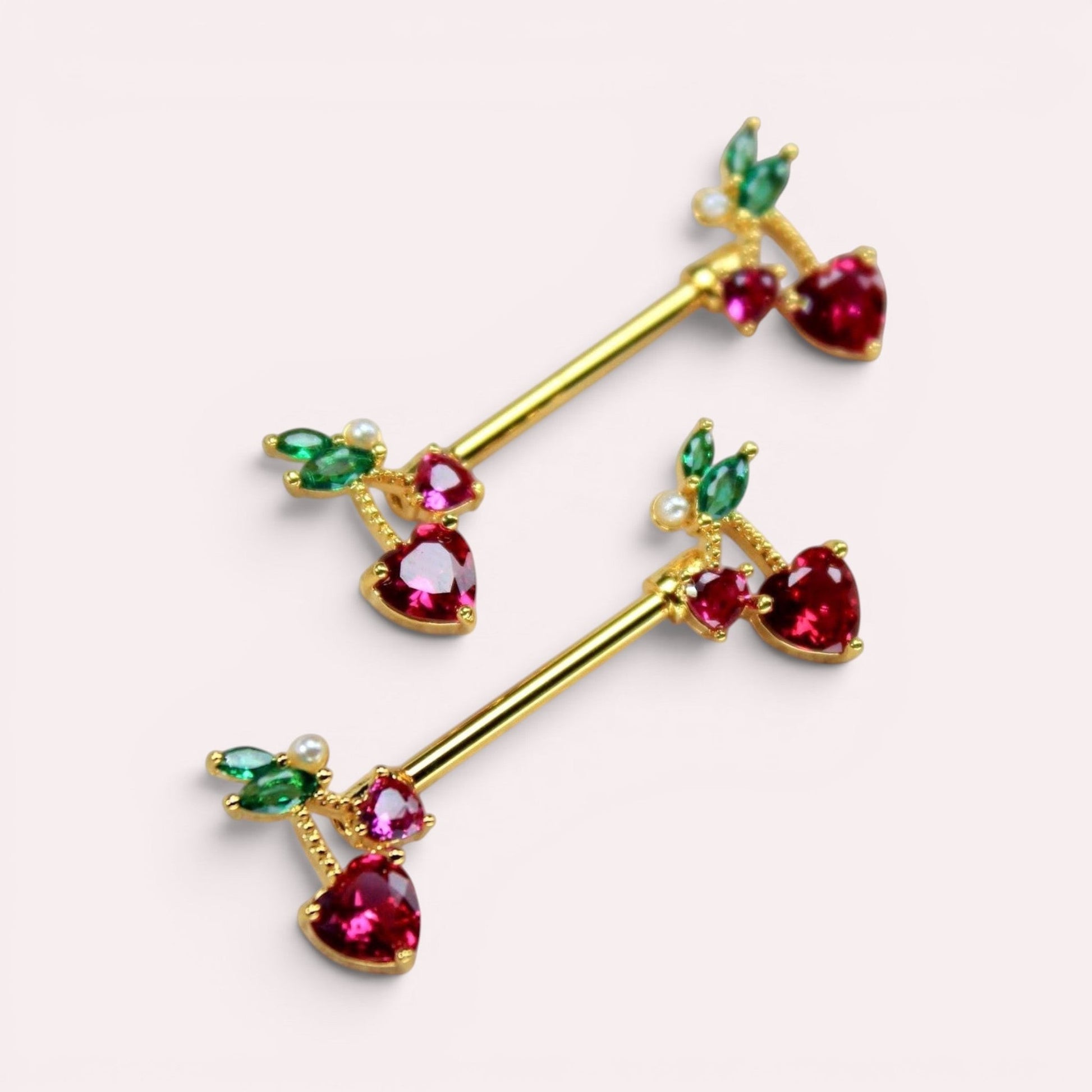 MKBodyJewelry gold cherry heart nipple barbell set with red and green crystal accents in surgical steel