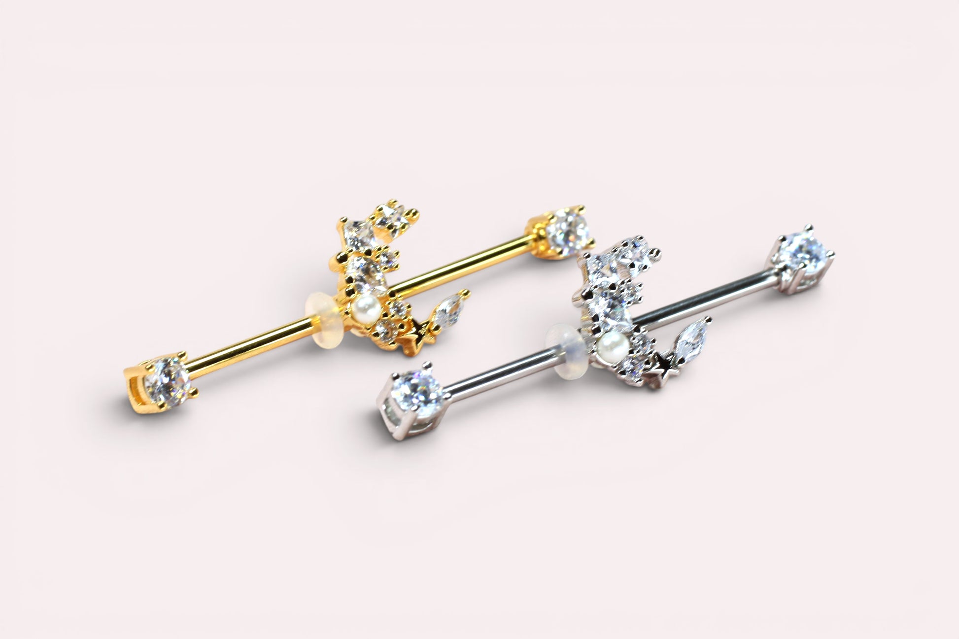 MKBodyJewelry dainty gold and silver surgical steel 14G crescent moon industrial barbell with clear cubic zirconia.