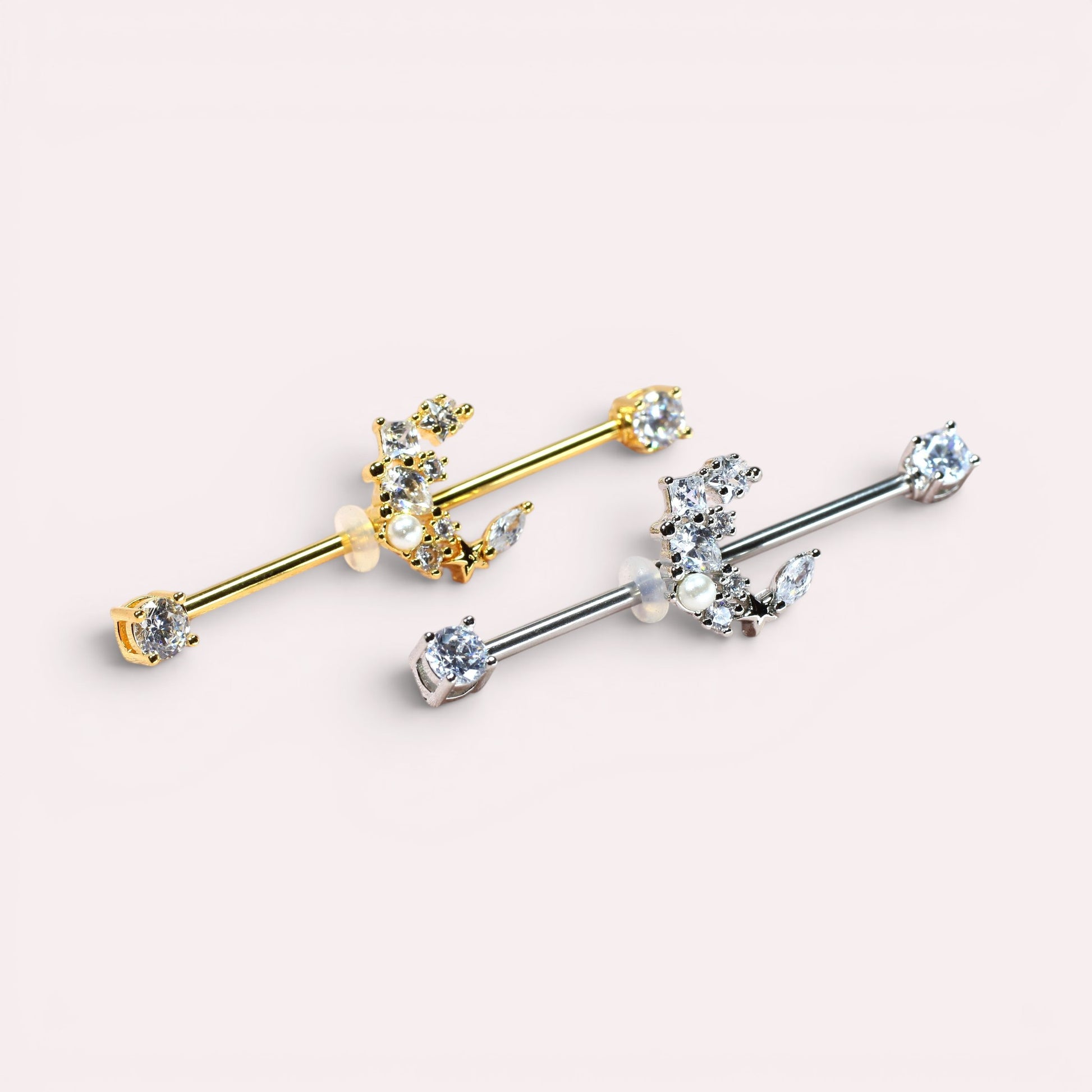 MKBodyJewelry dainty gold and silver surgical steel 14G crescent moon industrial barbell with clear cubic zirconia.