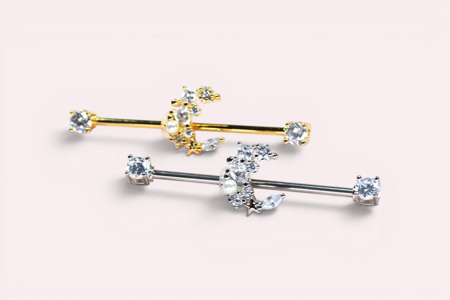 MKBodyJewelry dainty gold and silver surgical steel 14G crescent moon industrial barbell with cubic zirconia.