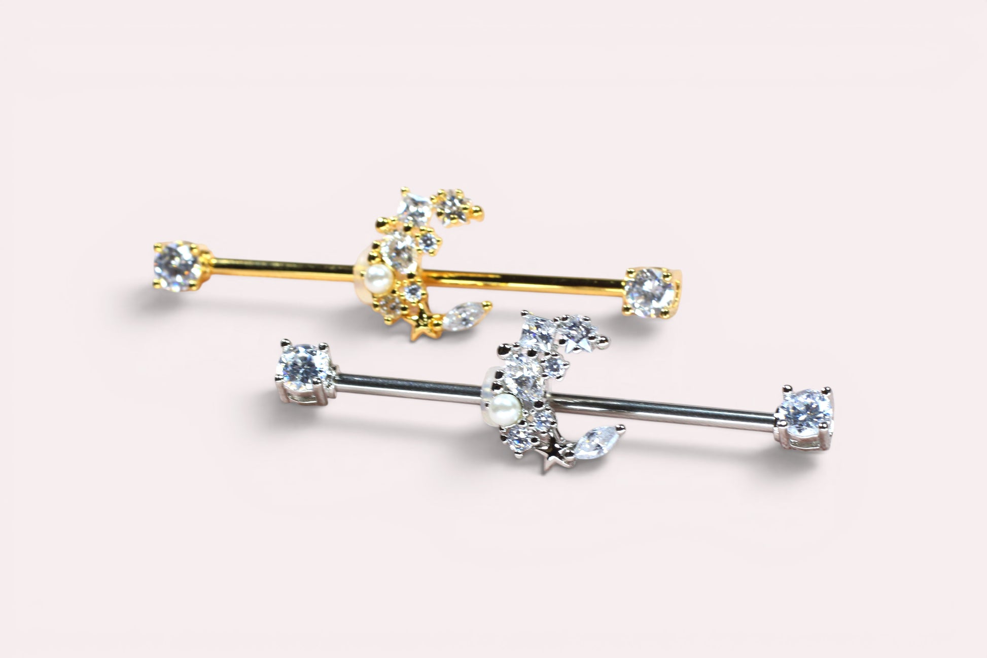 MKBodyJewelry dainty gold and silver surgical steel 14G crescent moon industrial barbell with cubic zirconia.