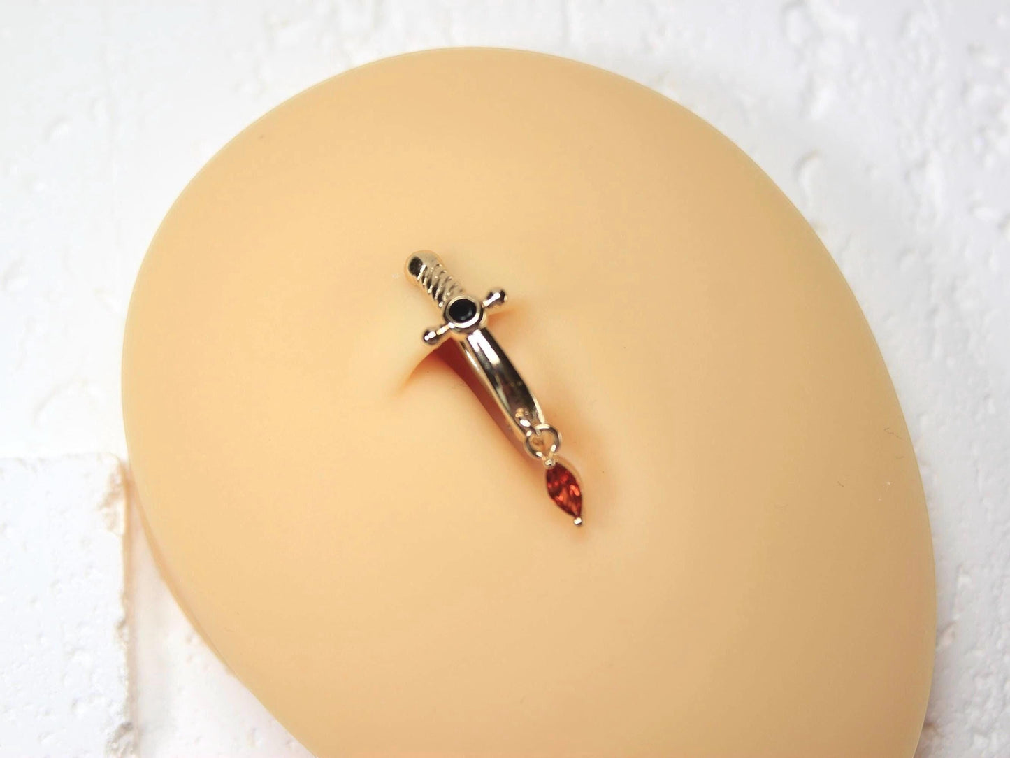 MKBodyJewelry silver dagger belly button ring with dangling orange CZ gem, stainless steel, 14G