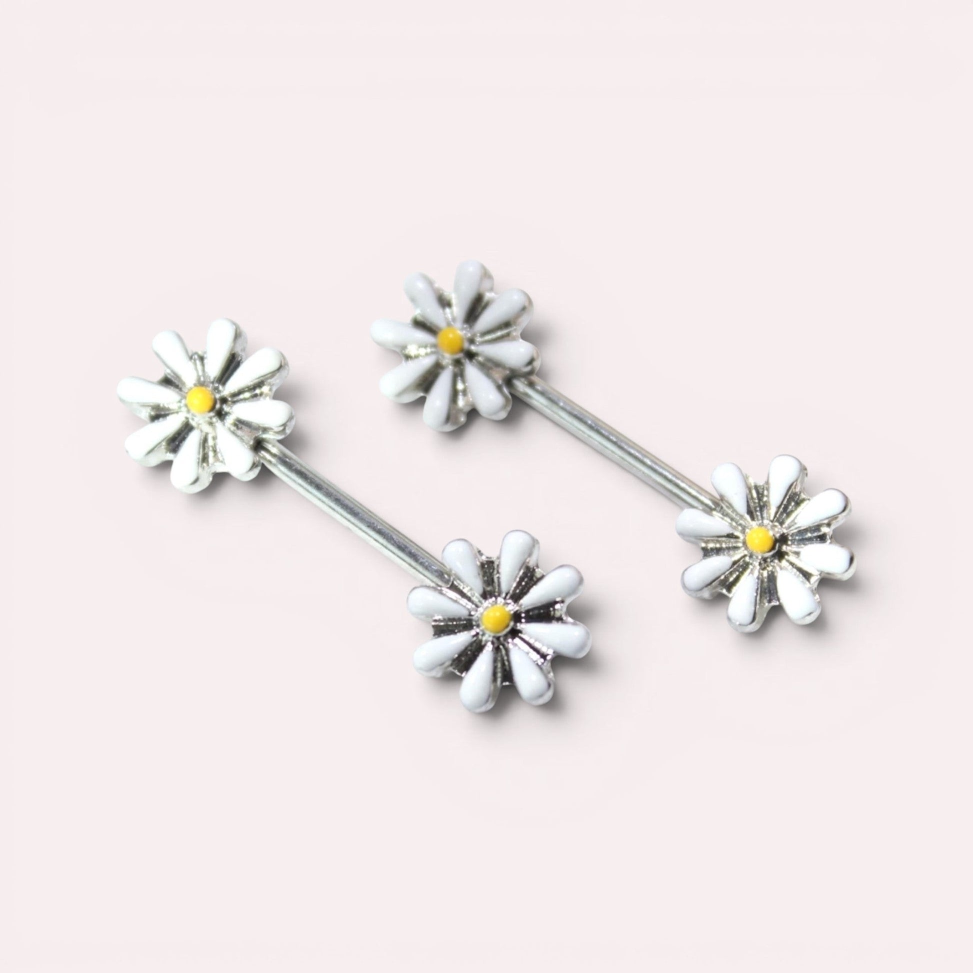 MKBodyJewelry 14G surgical steel nipple barbell set featuring white and yellow daisy flower designs.