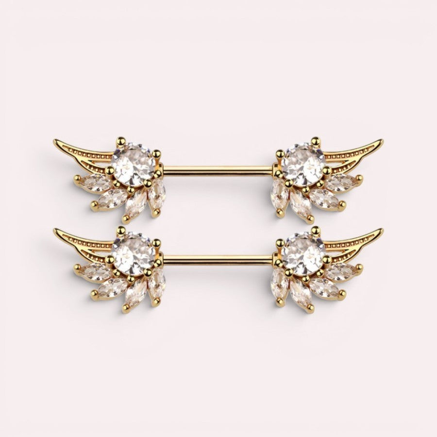 MKBodyJewelry 14g gold angel wing nipple barbell with clear crystals. Surgical steel and titanium construction.