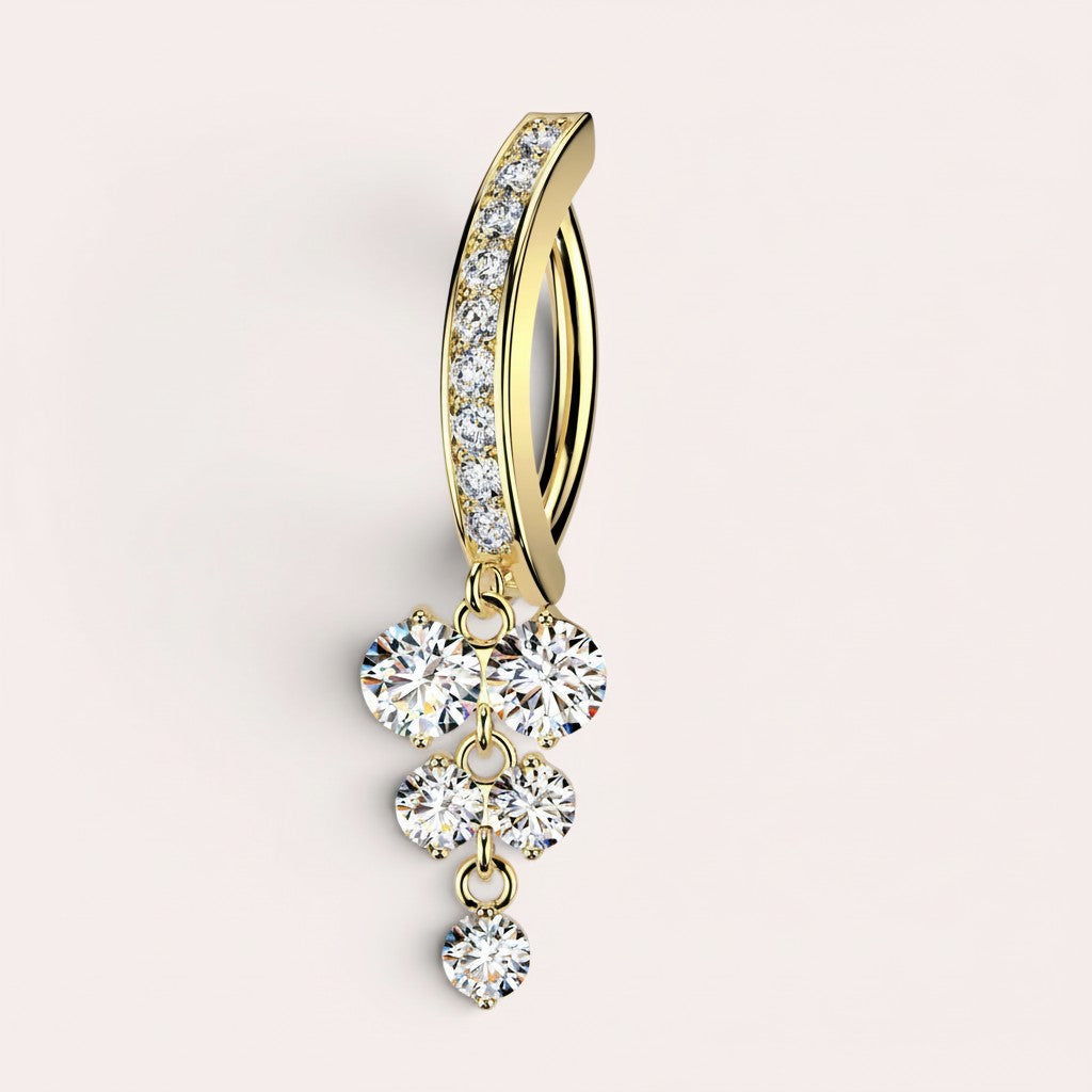 MKBodyJewelry 14k yellow gold belly button ring with a curved barbell adorned with cubic zirconia and a tiered dangle of five round gems.