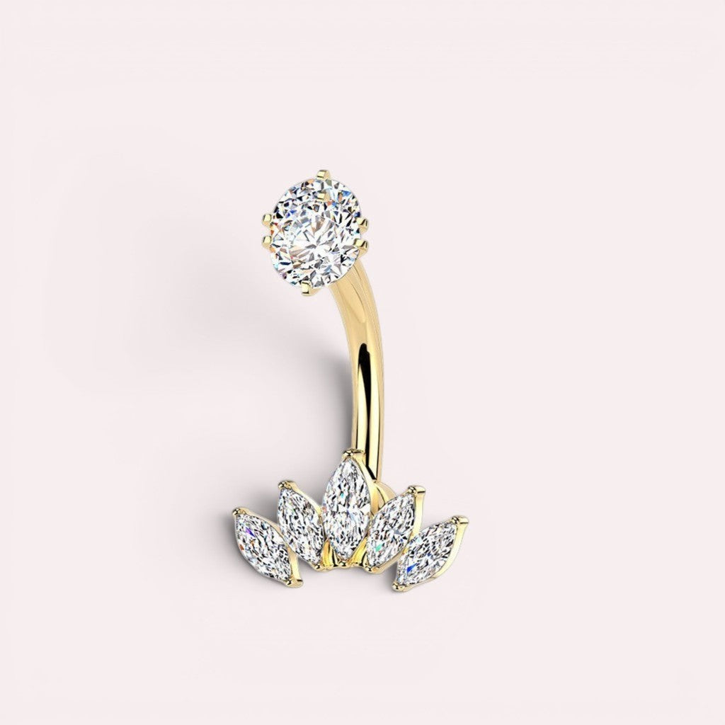 MKBodyJewelry gold-tone belly button ring with cubic zirconia gems. Features a curved barbell with a top gem and a fan of marquise gems below.