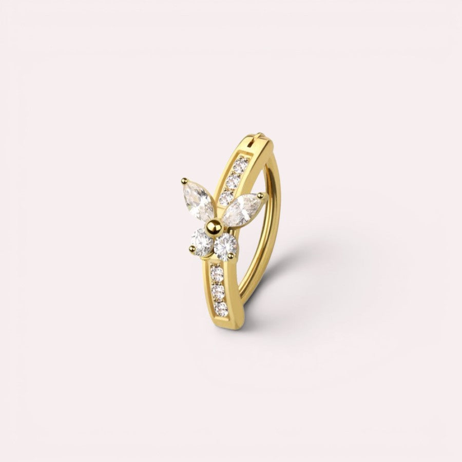 MKBodyJewelry 14G gold butterfly belly clicker ring with clear marquise and round cut gemstones on a polished hoop.