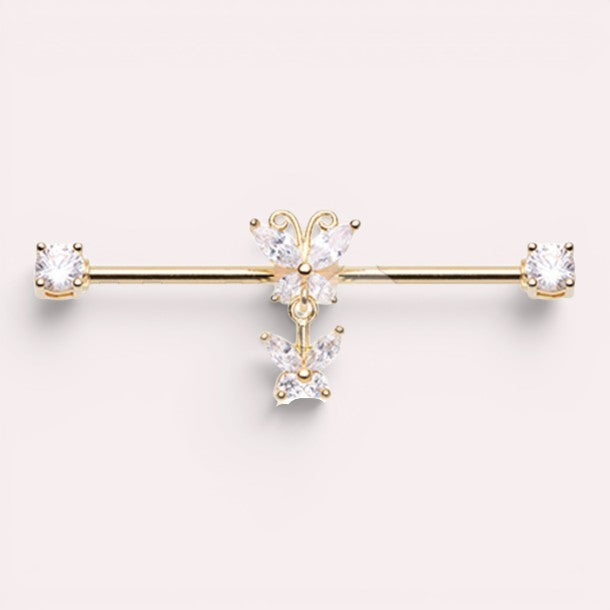 MKBodyJewelry gold surgical steel industrial barbell with dangling butterfly charms and clear cubic zirconia.