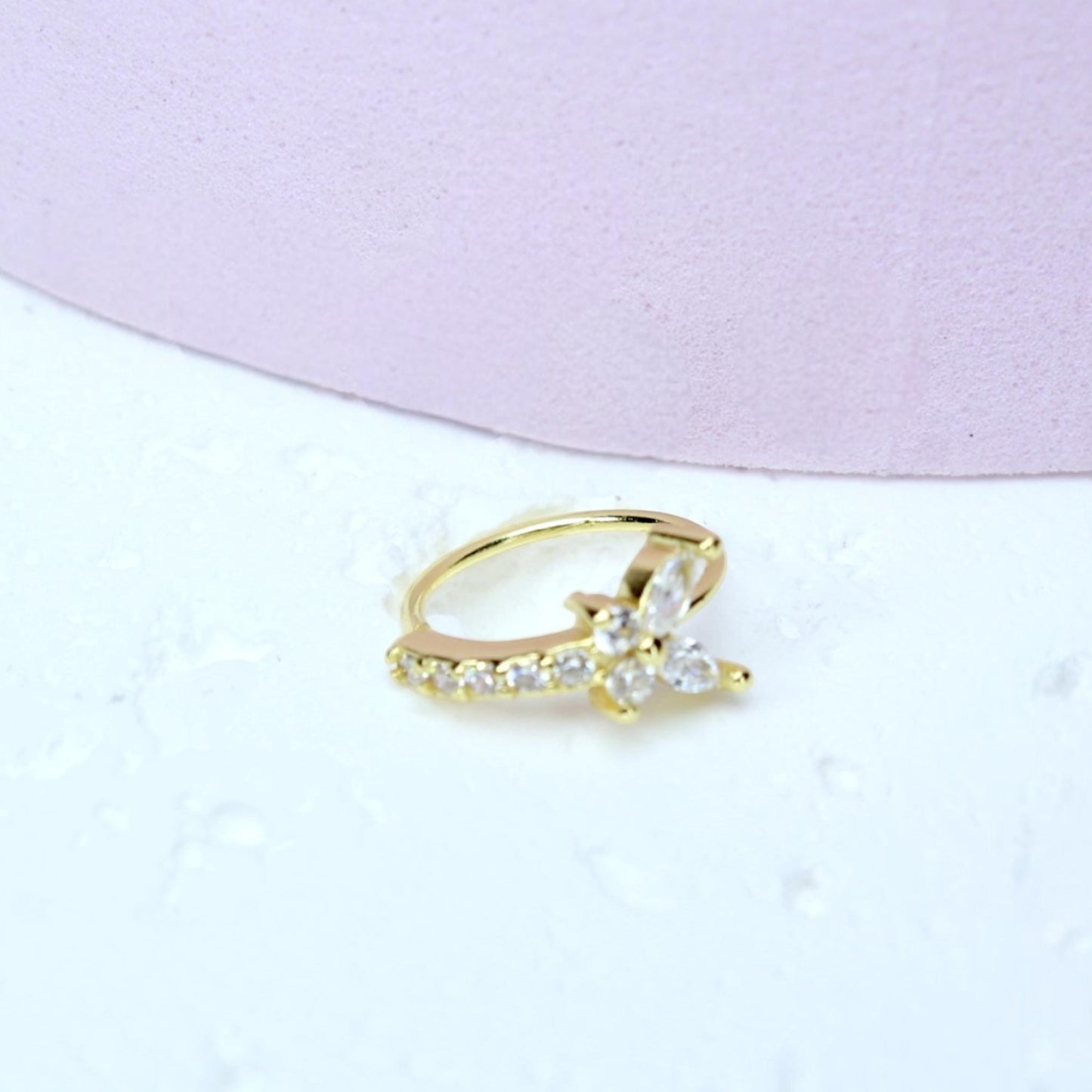 MKBodyJewelry gold surgical steel nose hoop featuring a sparkling cubic zirconia butterfly design for piercings