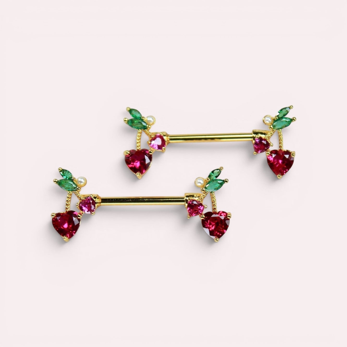 MKBodyJewelry gold cherry heart nipple barbell set with red and green crystal accents in surgical steel