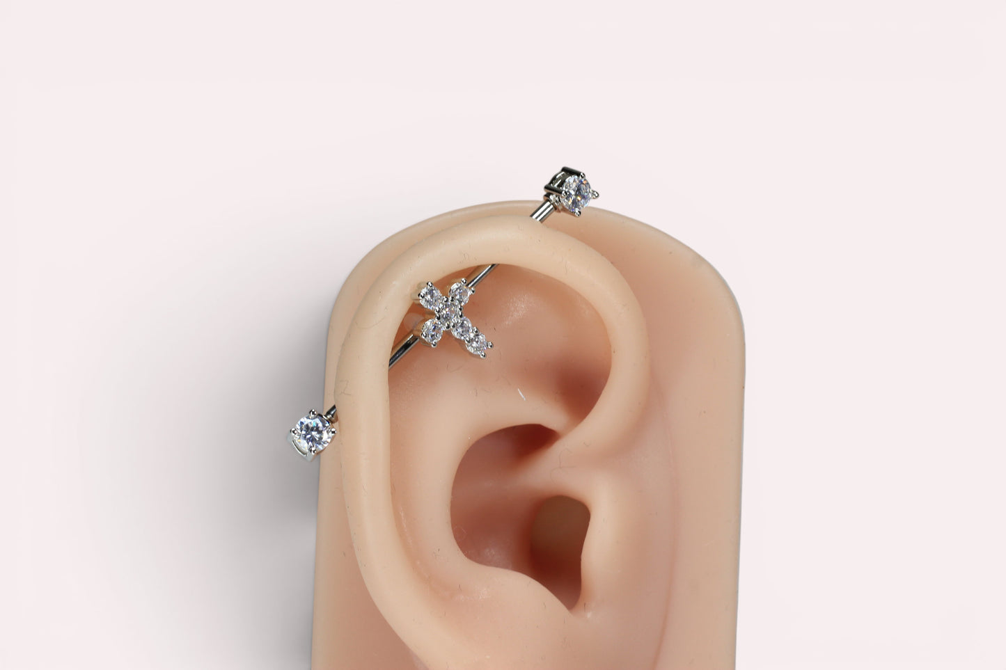 MKBodyJewelry dainty sparkling gold cross industrial barbell, 14G surgical steel, 35mm length, for cartilage piercings.