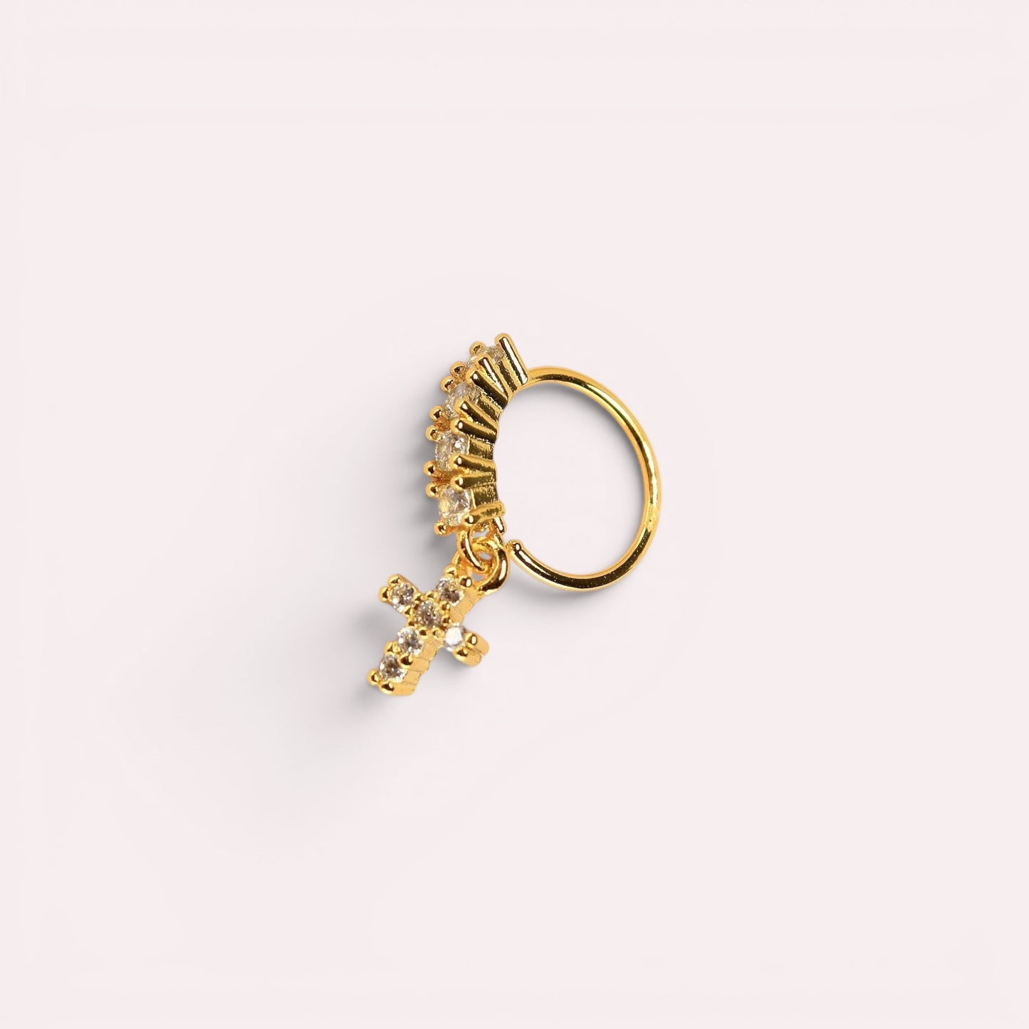 MKBodyJewelry 20g gold surgical steel nose hoop with a dangling CZ cross charm and crystal accents.