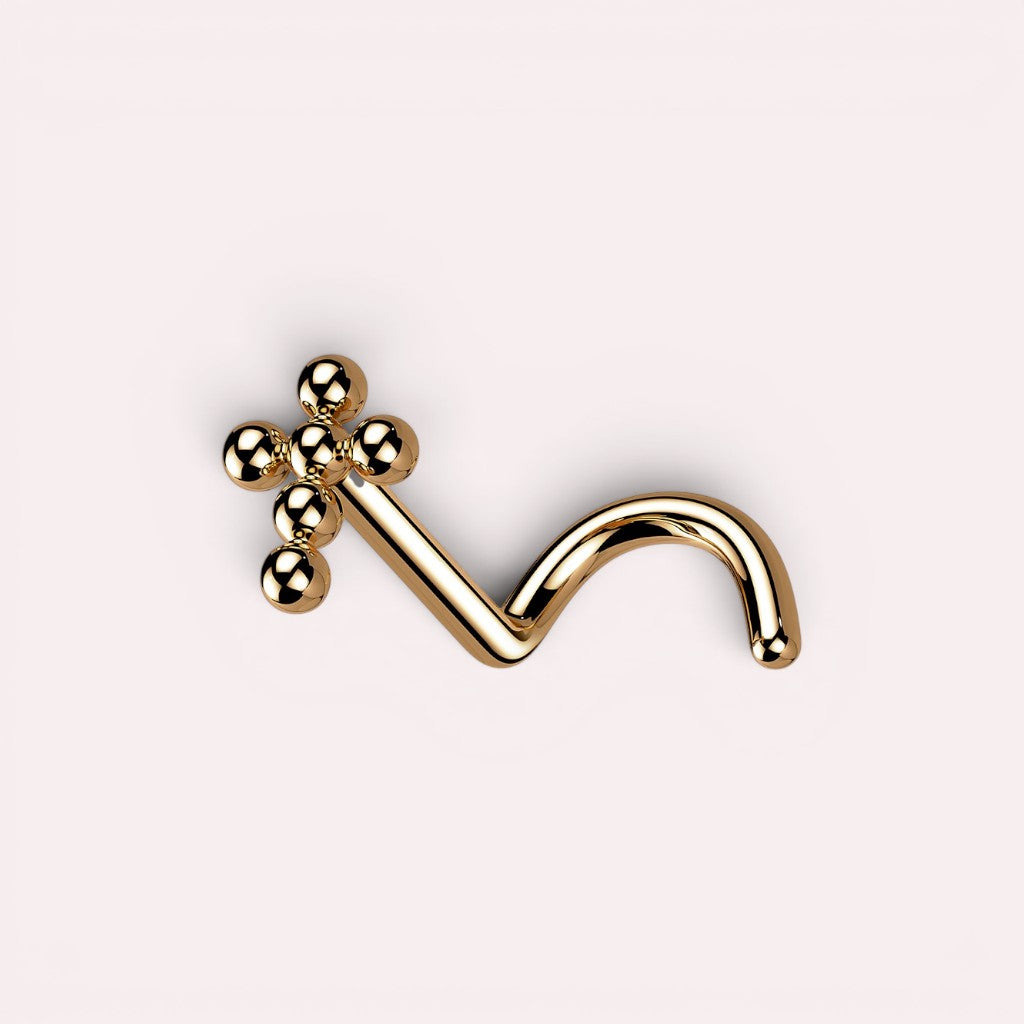 MKBodyJewelry gold titanium beaded cross nose stud with an S-shaped corkscrew post for secure piercing fit.