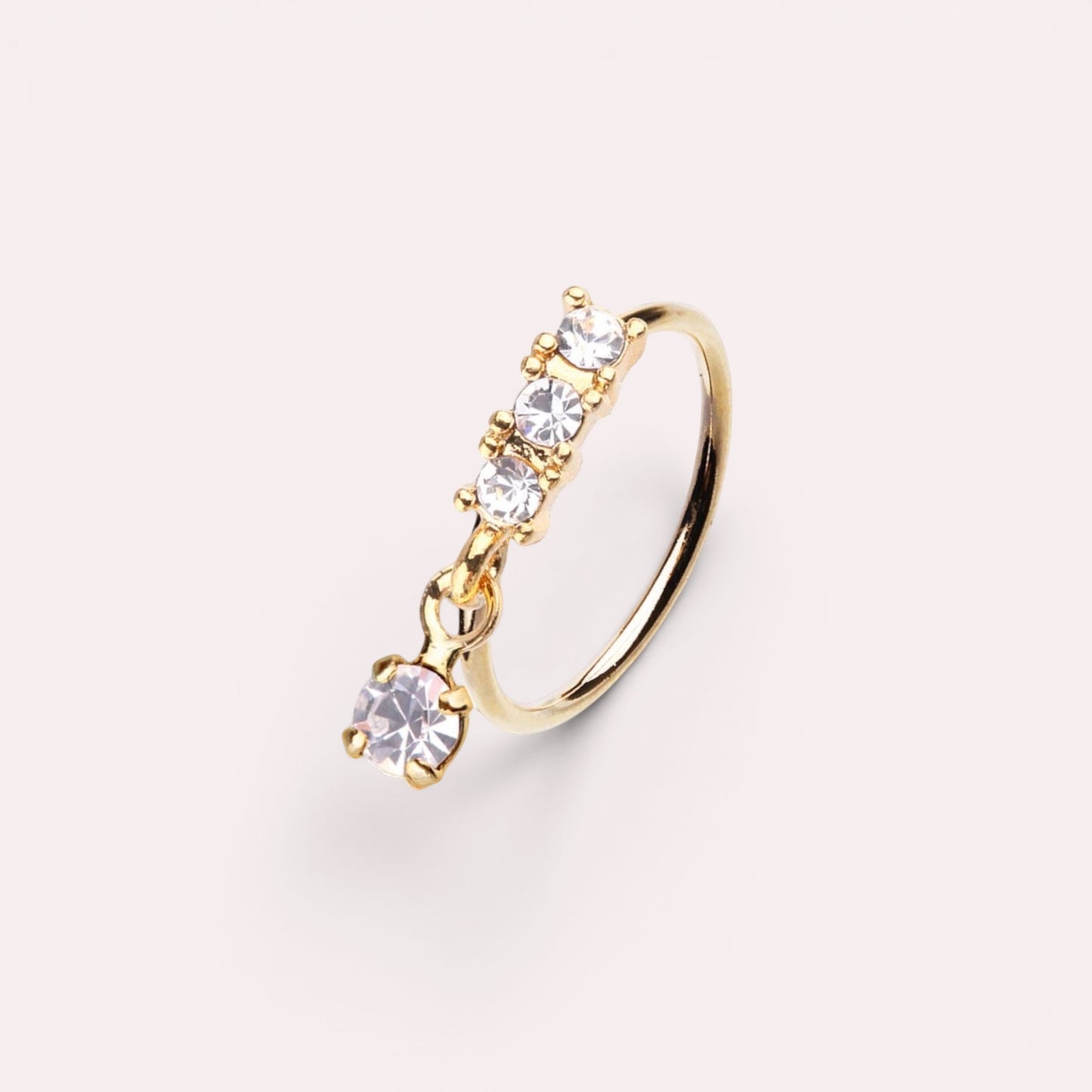 MKBodyJewelry gold surgical steel 20g nose hoop with dangling CZ charm and three accent stones for cartilage piercing