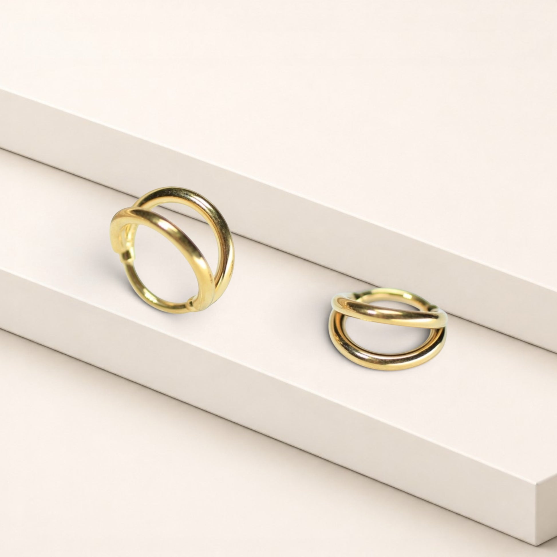 MKBodyJewelry gold double line titanium nose clicker ring with a minimalist snug fit design.
